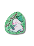 Green sticker with a rabbit and clover design and 'My Lucky Charm' text on a white background